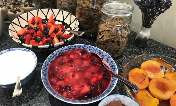 Fresh Fruit and cereals on the breakfast bar